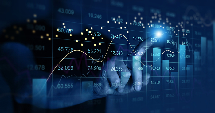 Trader analyzing data on virtual screen.Price graph and indicator. Stock market invest and crypto currency. Stock market and business investment.