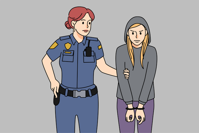 Police officer arrest teen girl criminalFemale police officer arrest naughty teen girl criminal behaving bad. Policeman put handcuffs on teenage thief or crime suspect. Juvenile and underage crime con